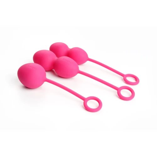 На фото изображены розовые вагинальные шарики из набора Svakom Nova Plum Red для женщин на белом фоне.