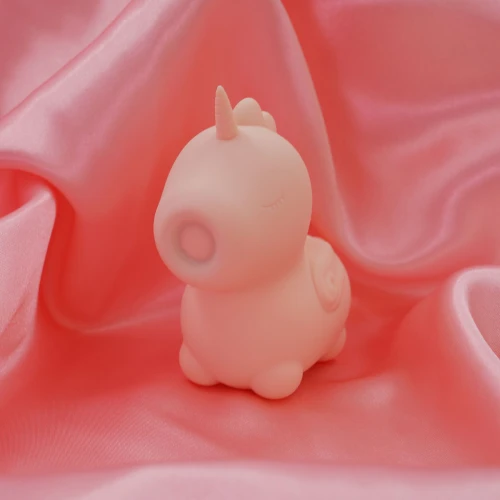 На фото розовый вибратор-единорожка Unihorn – Heart Throb, с пульсацией