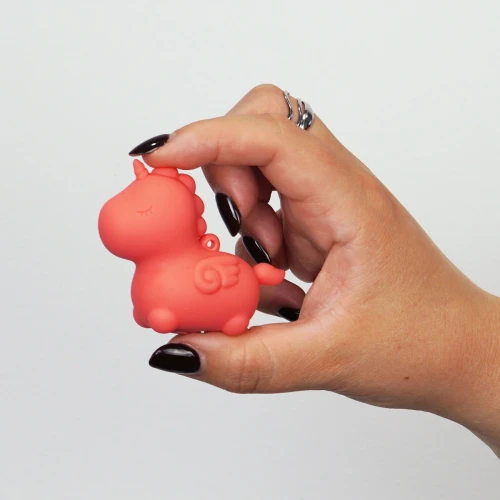 На фото вибратор-миниединорожка Unihorn Mini – Peachy Pony, брелок с вибрацией, 10 режимов