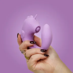На фото фіолетовий вібратор-єдиноріжка Unihorn – C Horse – Marina Lilac, вагінально-кліторальна стимуляція, 2 мотори по 10 режимів 