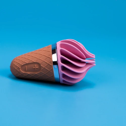 На фото изображен Satisfyer Lay-On Sweet Treat Pink/Brown – вибратор в виде мороженого, стильная вибропуля для стимуляции.