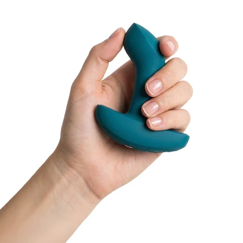 На фото анальная пробка Fun Factory Bootie Vibe Bottle Green