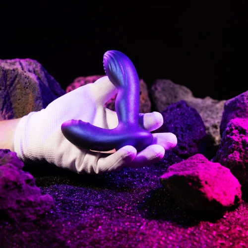 На фото анальна вібропробка з пульсацією Hueman - Galaxy Tapping Buttplug