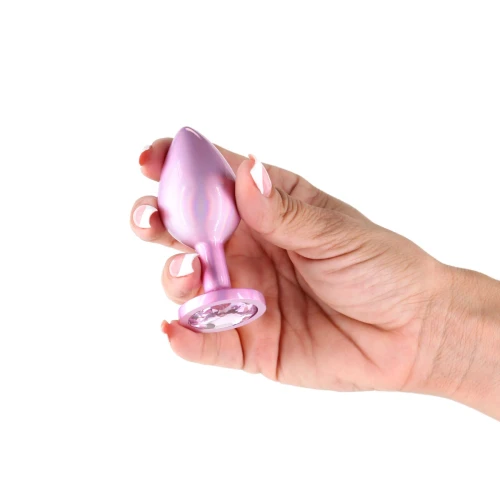 На фото анальная пробкаNS Novelties Rear Assets - Iridescent Pink - Medium - Pink