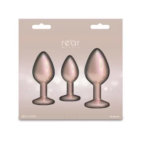 На фото набор анальных пробок NS Novelties Rear Assets - Trainer Kit - Iridescent Champagne - Clear Gem