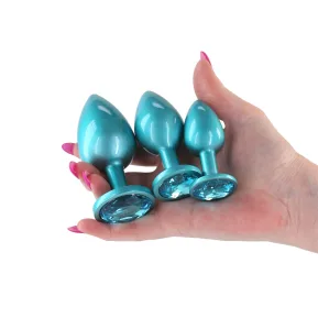 На фото набор анальных пробок NS Novelties Rear Assets - Trainer Kit - Iridescent Teal - Teal Gem