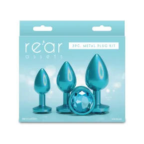 На фото набор анальных пробок NS Novelties Rear Assets - Trainer Kit - Iridescent Teal - Teal Gem