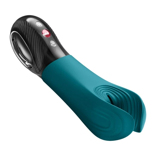 На фото вибратор для пениса Fun Factory MANTA Bottle Green подходит для парных игр.