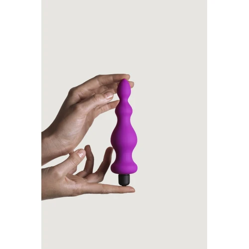 На фото изображен фиолетовый анальный стимулятор Adrien Lastic Bullet Amuse Purple унисекс на светлом фоне