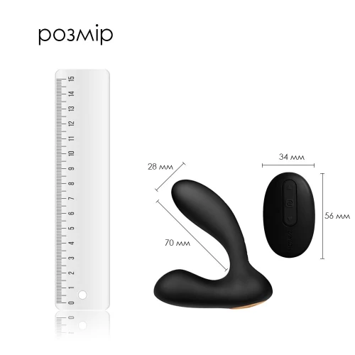 На фото зображено чорний масажер простати з двома моторами для чоловіків на світлому фоні.