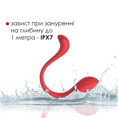 На фото изображено красное смарт виброяйцо Svakom Phoenix Neo для женщин на белом фоне.