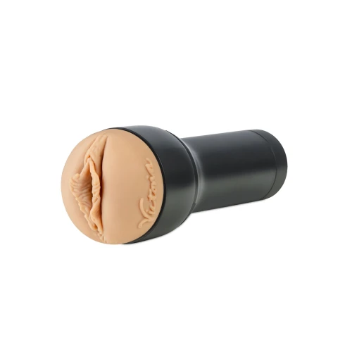 На фото изображен бежево-черный мастурбатор-вагина Kiiroo Feel Victoria June PBC который совместим с PowerBlow и Keon  для мужчин на белом фоне