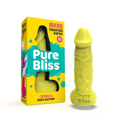 На фото изображено желтое крафтовое мыло-член с присоской Pure Bliss BIG Yellow унисекс на белом фоне.