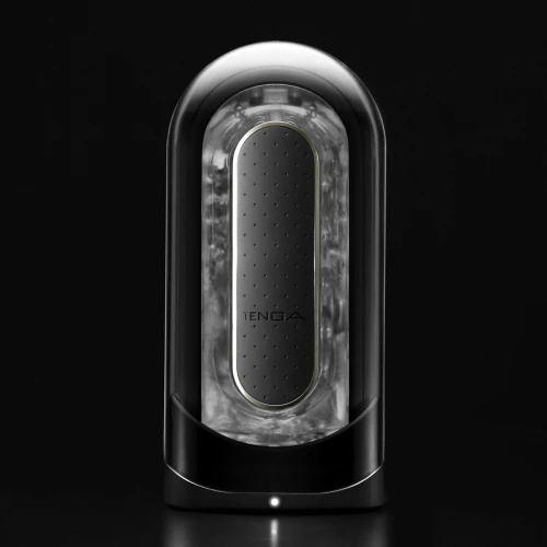 На фото зображено чорний Tenga Flip Zero Electronic Vibration Black - Мастурбатор із двома вібруючими ядрами для чоловіків на чорному тлі