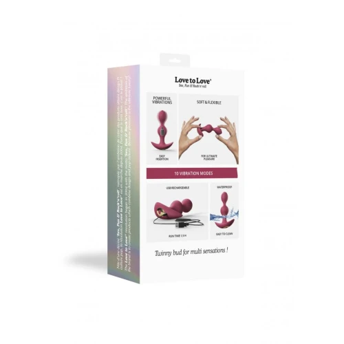 На фото зображений гнучкий та рожевий анальний стимулятор Love To Love TWINNY BUD Plum унісекс на світлому фоні