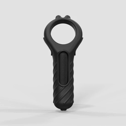 На фото зображено чорне ерекційне кільце вібропуля Bathmate Vibe Edge для чоловіків на сірому фоні