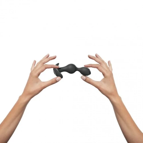 На фото изображен гибкий и черный анальный стимулятор Love To Love TWINNY BUD Black унисекс на светлом фоне