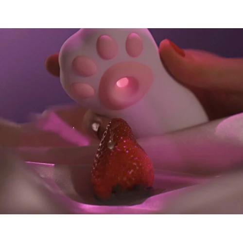 На фото зображено рожевий вакуумний стимулятор Otouch Cici Kity Plus для жінок на різнокольоровому  тлі.