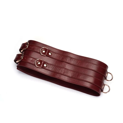 На фото изображен коричневый пояс для бандажа Liebe Seele Wine Red Waist Cuff (L) унисекс на белом фоне 