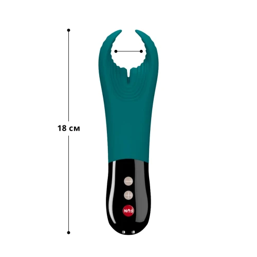 На фото зображено чорно-бірюзовий вібратор для пеніса Fun Factory MANTA blue/black для чоловіків на білому тлі