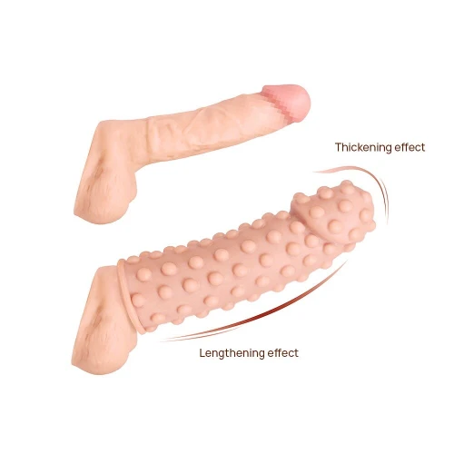 На фото зображено бежеву насадку на член пупирчасту Kokos Extreme Sleeve ES.02 розміру S для пар на білому тлі.