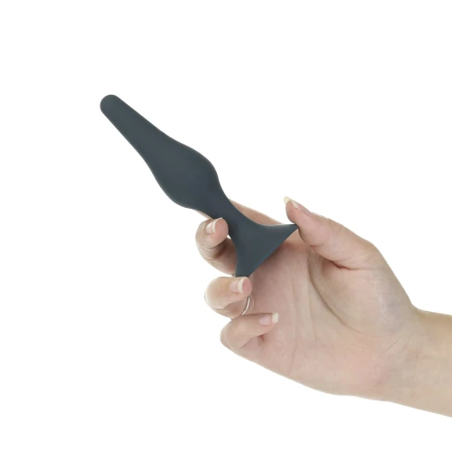 На фото изображена часть набора анальных игрушек Lux Active - Silicone Anal Training Kit унисекс на белом фоне