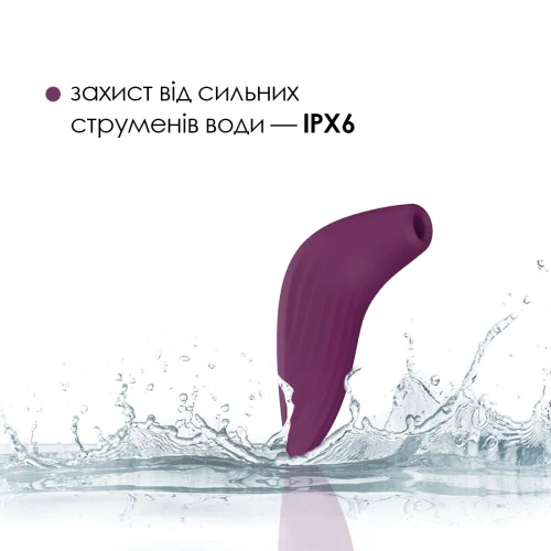 На фото изображен темно-фиолетовый вакуумный вибратор Svakom Pulse Union для женщин на белом фоне.