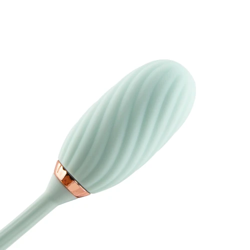 На фото зображено зелений вакуумний стимулятор із вібрацією Otouch Louis Vibrate для жінок на білому тлі.