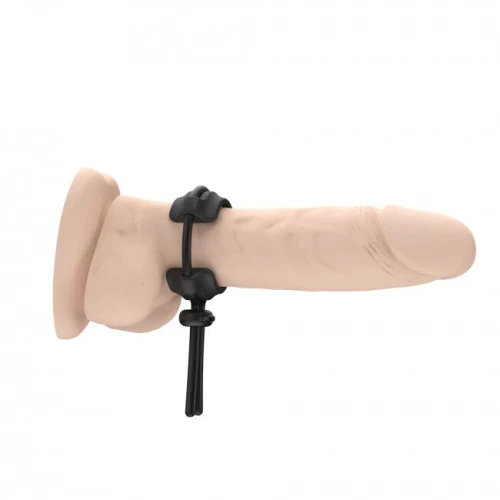 На фото зображено чорне ерекційне кільце, що регулюється, Dorcel FIT RING для чоловіків на білому тлі