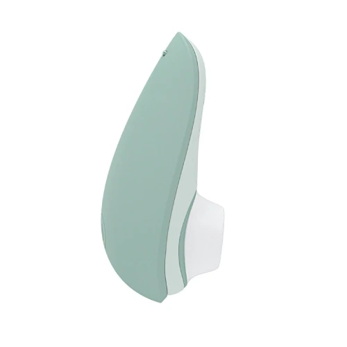 На фото изображен салатовый вакуумный стимулятор Womanizer Liberty 2 Sage для женщин на белом фоне.