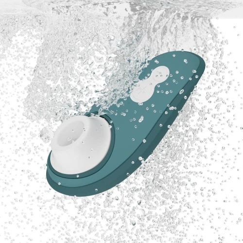 На фото изображен зеленый вакуумный стимулятор Womanizer Liberty 2 Dark Petrol для женщин на белом фоне.