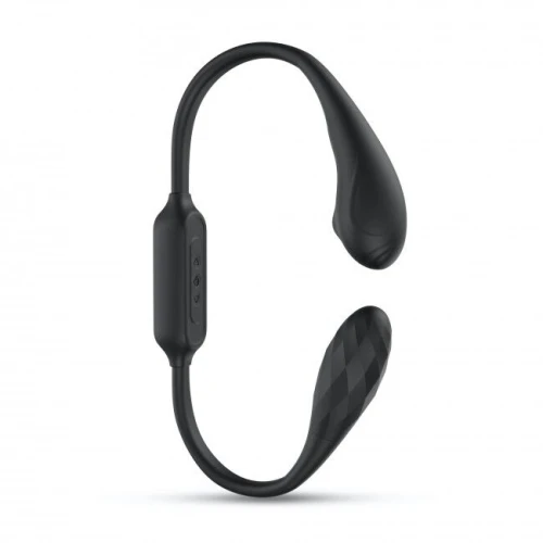 На фото изображен черный двойной вибратор с вибрацией и жемчужным массажем Dorcel DUAL EXPLORER для пар на белом фоне.