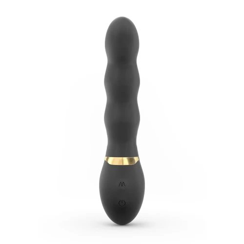 На фото изображен черный Dorcel Too Much Rechargeable Black - Вибратор с тремя мощнейшими моторами и ультрастимуляцией для женщин на светлом фоне 