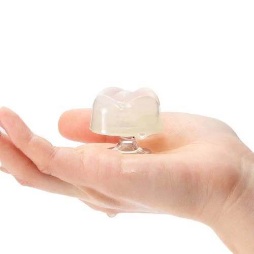 На фото зображено напівпрозорий силіконовий стимулятор для ерогенних зон IROHA Petit Lily для пар на білому тлі.