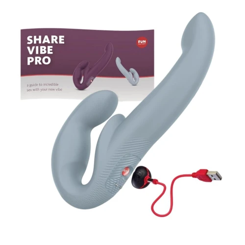На фото зображено сірий безрем'яний страпон з вібрацією Fun Factory SHARE VIBE PRO для пар на білому тлі