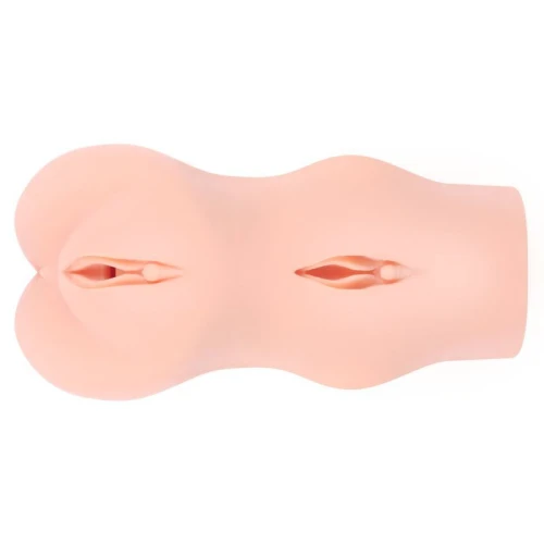 На фото изображен бежевый двухслойный мастурбатор-вагина Kokos Dream на светлом фоне