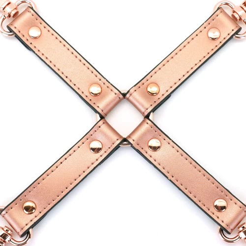 На фото зображено хрестовину для банджалу кольору рожевого золота Liese Seele Rose Gold Memory Hog Tie унісекс на білому тлі