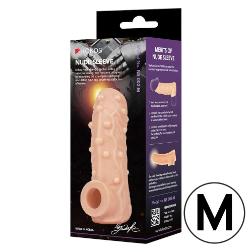 На фото изображена бежевая сквозная насадка на член Kokos Nude Sleeve NS 002 М для пар на белом фоне.