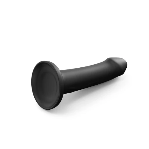 На фото изображен черный фаллоимитатор на присоске Dorcel Real Pleasure XL Black на белом фоне.