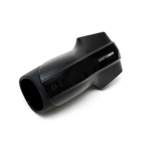 На фото изображен черный мастурбатор с вибрацией Satisfyer Men Vibration для мужчин на светлом фоне