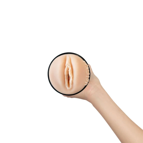 На фото изображен бежево-черный мастурбатор-вагина РБС Kiiroo Feel MelRose Michaels  PBC который совместим с PowerBlow и Keon для мужчин на белом фоне