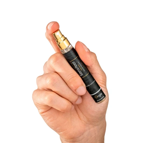 На фото изображены черные духи с феромонами Orgie – Sensfeel for Man Travel Size (10 мл) для мужчин на белом фоне.