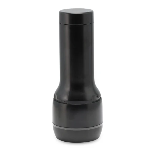 На фото зображено чорний мастурбатор-вагін для секс-машини Kiiroo Keon Kiiroo Feel Stroker Light Brown світлому фоні