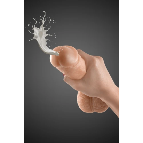 На фото зображено бежевий силіконовий фалоімітатор із сім'явипорскуванням Real Body - Cum Kane для жінок на чорному тлі.