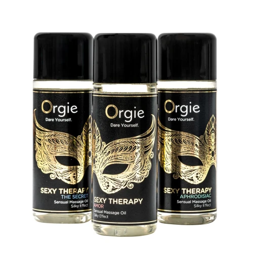 На фото зображено чорний набір масажних олій Orgie - Sexy Therapy Mini Size Collection (3х30 мл) для пар на білому тлі.