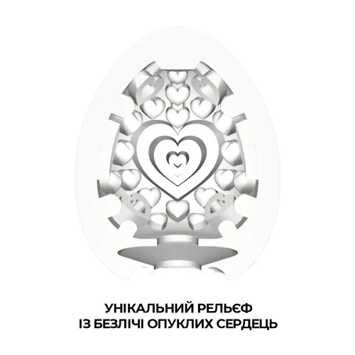 На цьому фото зображено біле яйце-мастурбатор Tenga Egg Lovers для чоловіків на світлому фоні.