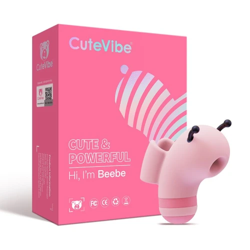На фото изображен розовый вакуумный вибратор Пчелка с черными ушками CuteVibe Beebe Pink для женщин на белом фоне.