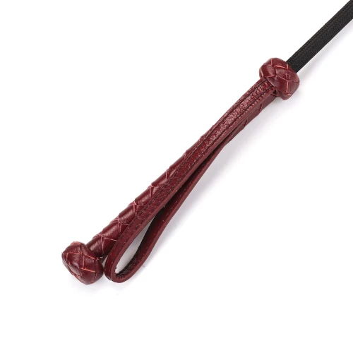 На фото изображена красная шлепалка в виде сердечка Liebe Seele Wine Red Riding Crop унисекс на белом фоне