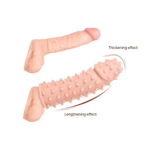 На фото зображено бежеву насадку на член пупирчасту Kokos Extreme Sleeve ES.03 розміру S для пар на білому тлі.