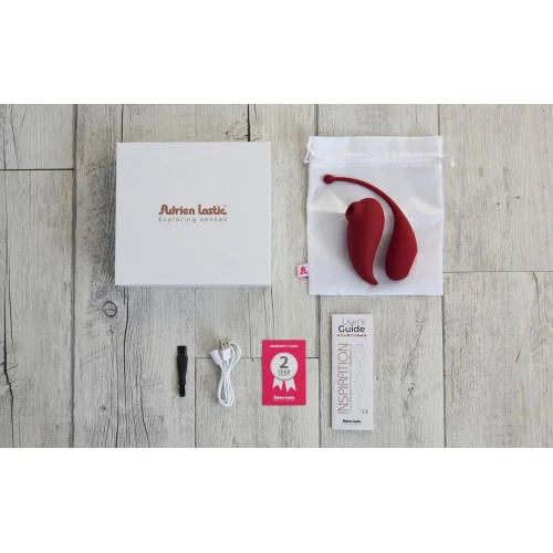 На фото изображено бордовое смарт виброяйцо и вакуумный стимулятор Adrien Lastic Inspiration для женщин на белом фоне.
